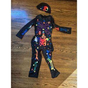 Skeleton Costume Size large 8-10 spooky bones one piece jumpsuit with hat